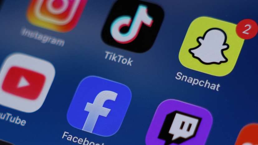 Social media apps are displayed on a mobile phone