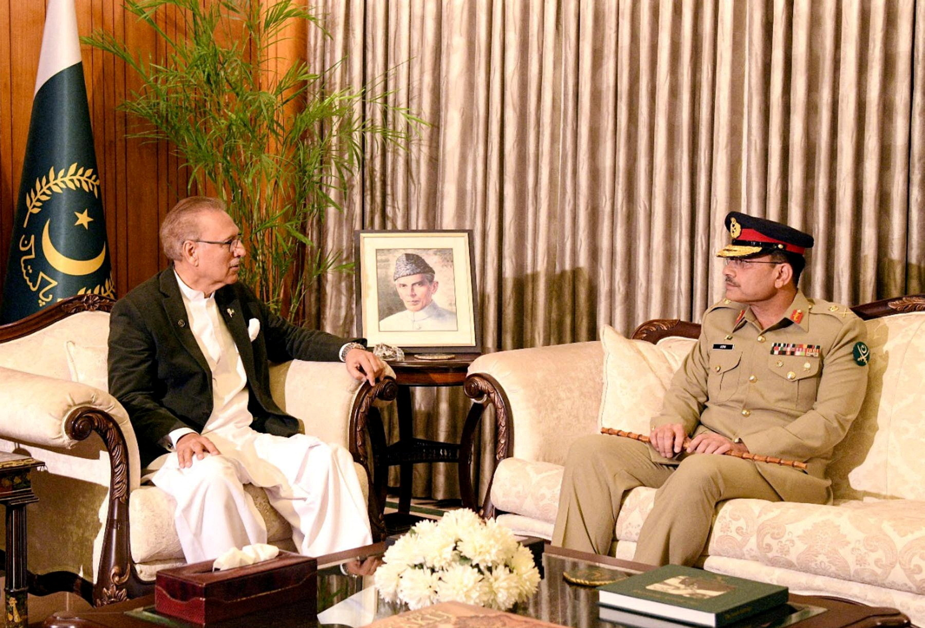 FILE PHOTO: Lieutenant General Munir, appointed as the new Chief Of Army Staff of Pakistan, meets with President of Pakistan Arif Alvi, in Islamabad