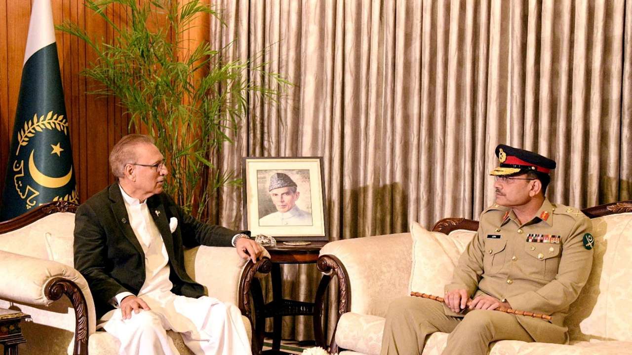 FILE PHOTO: Lieutenant General Munir, appointed as the new Chief Of Army Staff of Pakistan, meets with President of Pakistan Arif Alvi, in Islamabad