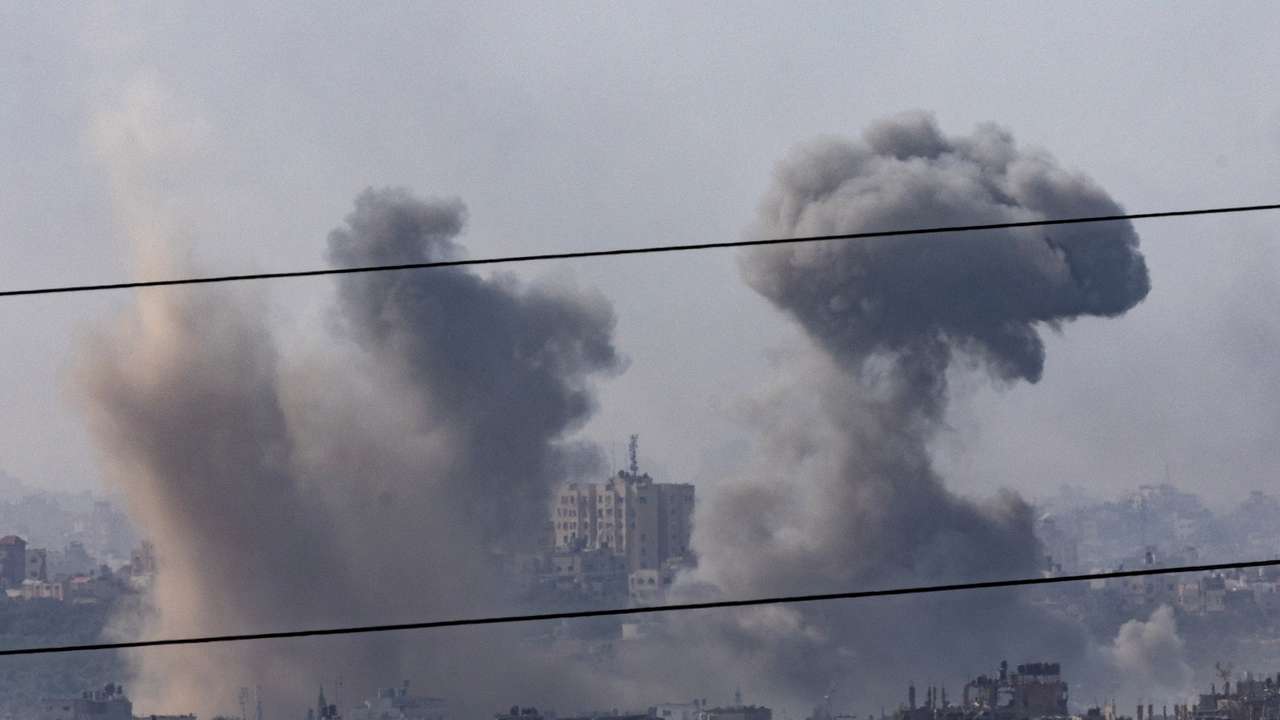 Smoke rises inside the Gaza Strip as seen from Israel