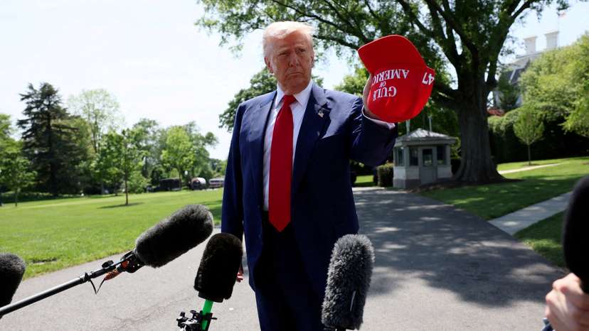 U.S. President Donald Trump boards Marine One as he departs for Michigan