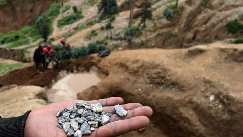 FILE PHOTO: A miner shows coltan in Birambo, Masisi territory, North Kivu Province of Democratic Republic of Congo