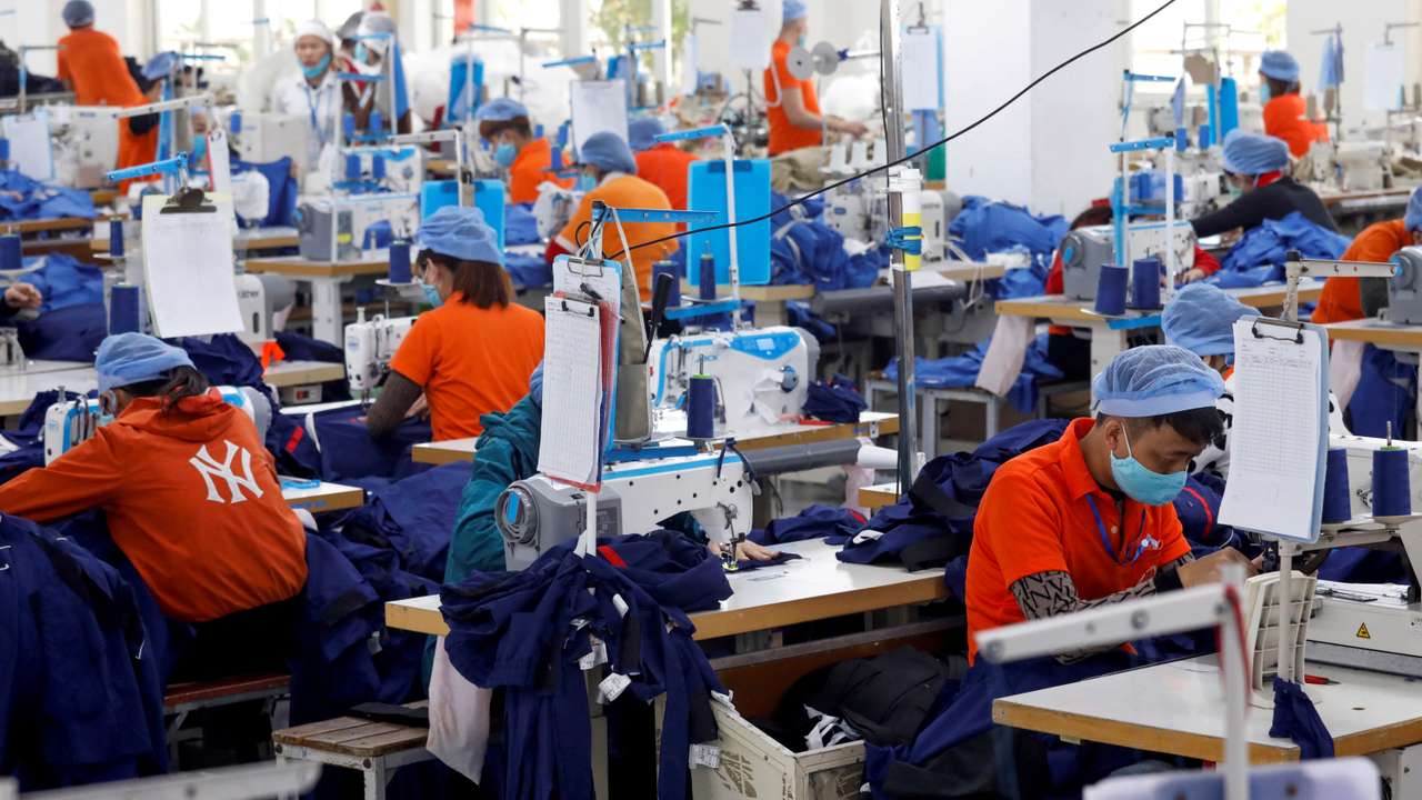 FILE PHOTO: The making garment products for export at a factory in Hung Yen province