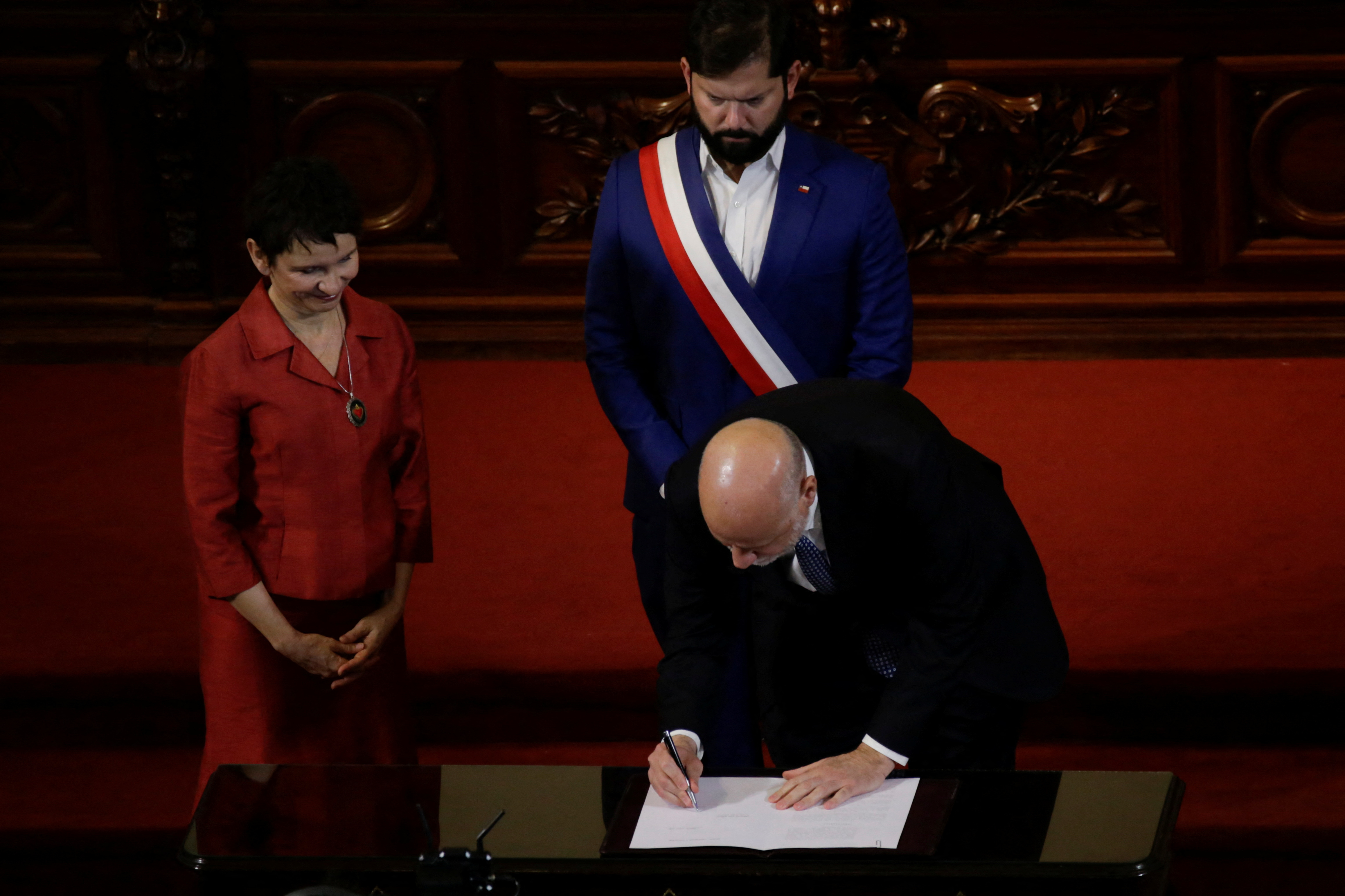 Chile’s President Gabriel Boric receives a second Constitution draft by the Constitutional Council, in Santiago