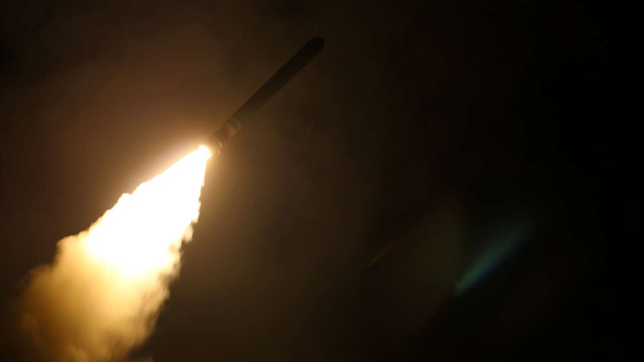The guided-missile destroyer USS Laboon fires a Tomahawk land attack missile