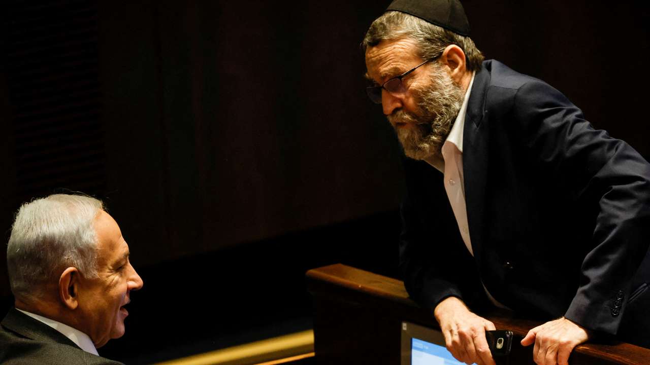 FILE PHOTO: Moshe Gafni, head of United Torah Judaism party, chats with Israeli designate Prime Minister Benjamin Netanyahu during a session at the plenum at the Knesset, Israel's parliament in Jerusalem
