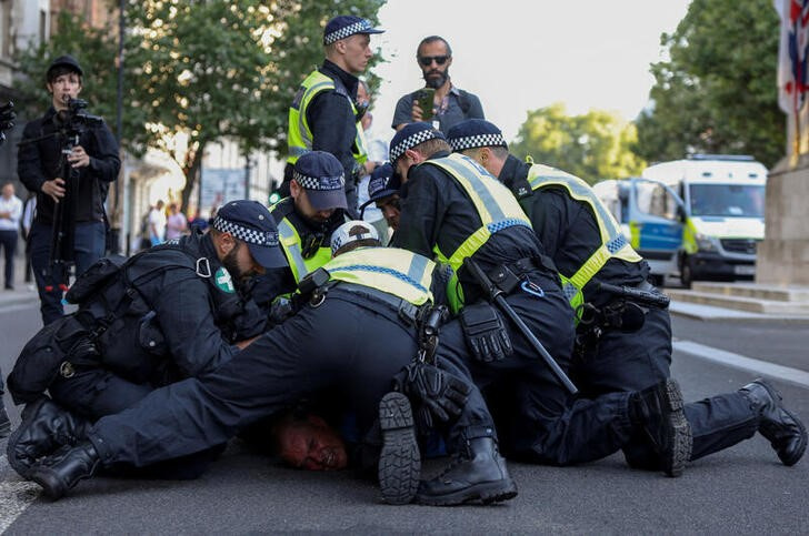 People protest illegal immigration outside of Downing Street in London