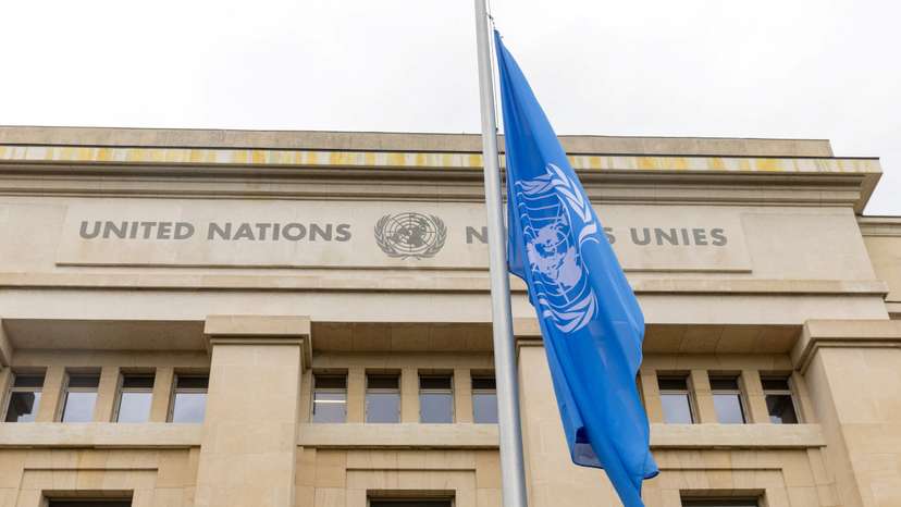 The United Nations flag flies at half-mast at the European headquarters in Geneva