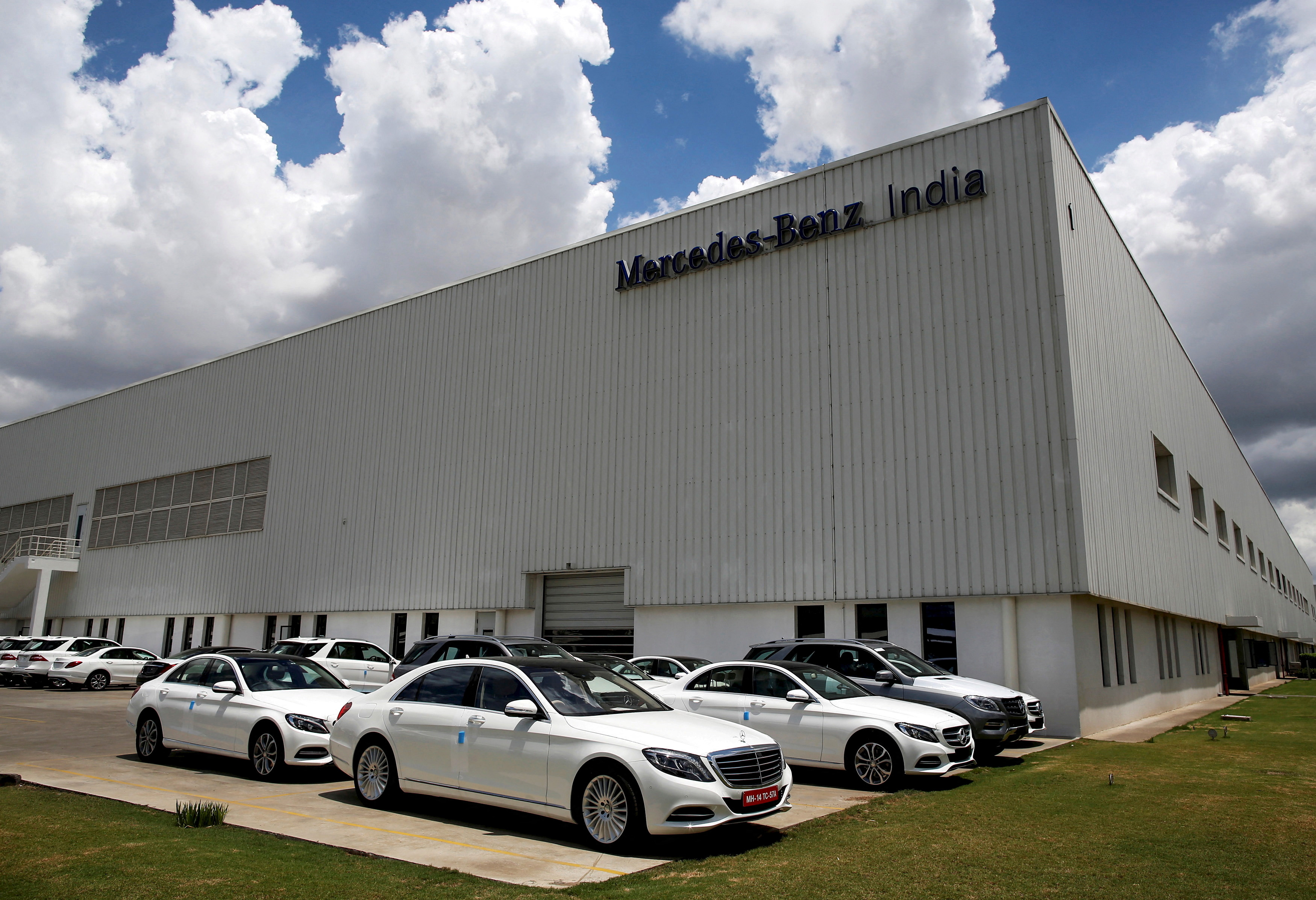 FILE PHOTO: Different models of Mercedes-Benz cars are parked at the company's vehicle assembly plant in Chakan