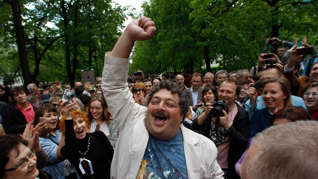 Russian author Bykov speaks to the crowd during a writers march lead by opposition literary activists in Moscow