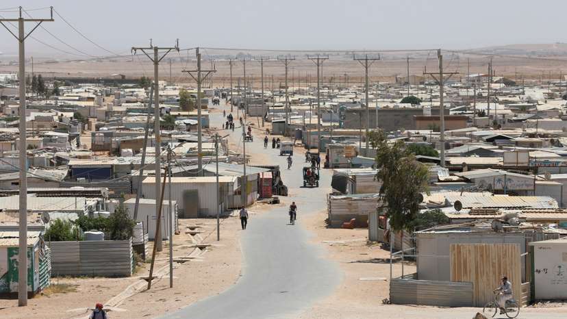 Syrian refugees are seen at the Zaatari refugee camp in the Jordanian city of Mafraq