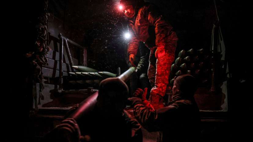 FILE PHOTO: Ukrainian serviceman prepares to fire a BM-21 Grad multiple-launch rocket system toward Russian troops on a front line near the town of Chasiv Yar