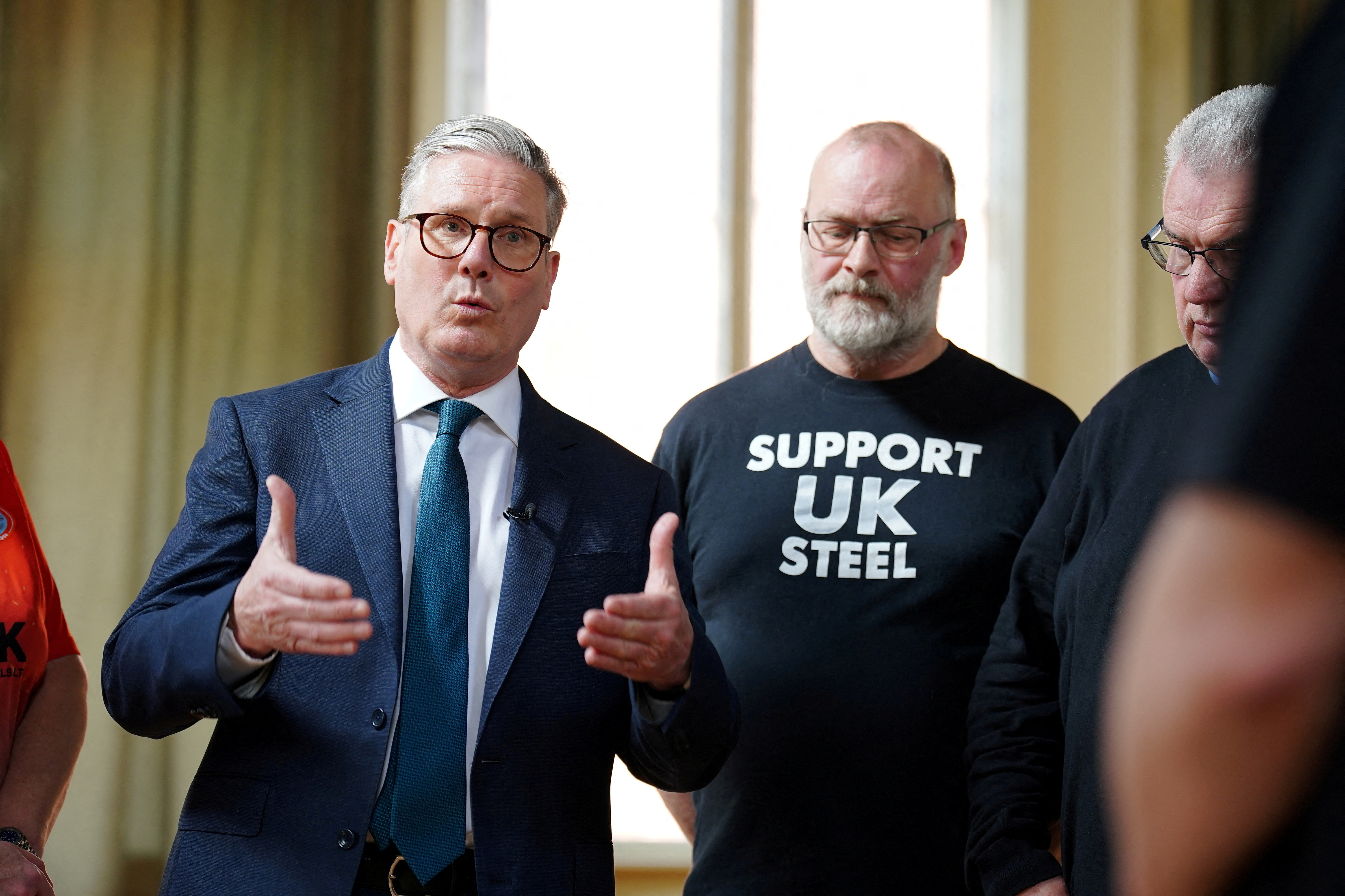 FILE PHOTO: Prime Minister Keir Starmer meets British Steel workers in Appleby