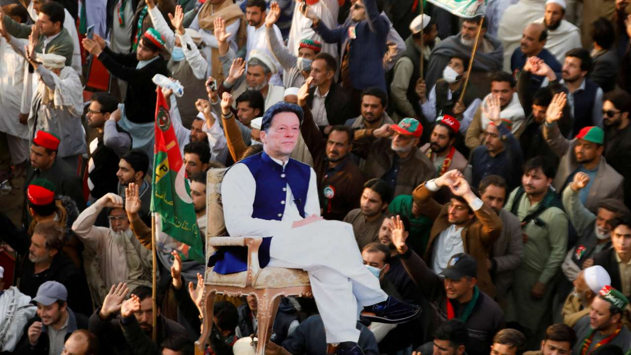 FILE PHOTO: Supporters of the former Pakistani Prime Minister Imran Khan protest against what they call a black day during a rally in Swabi