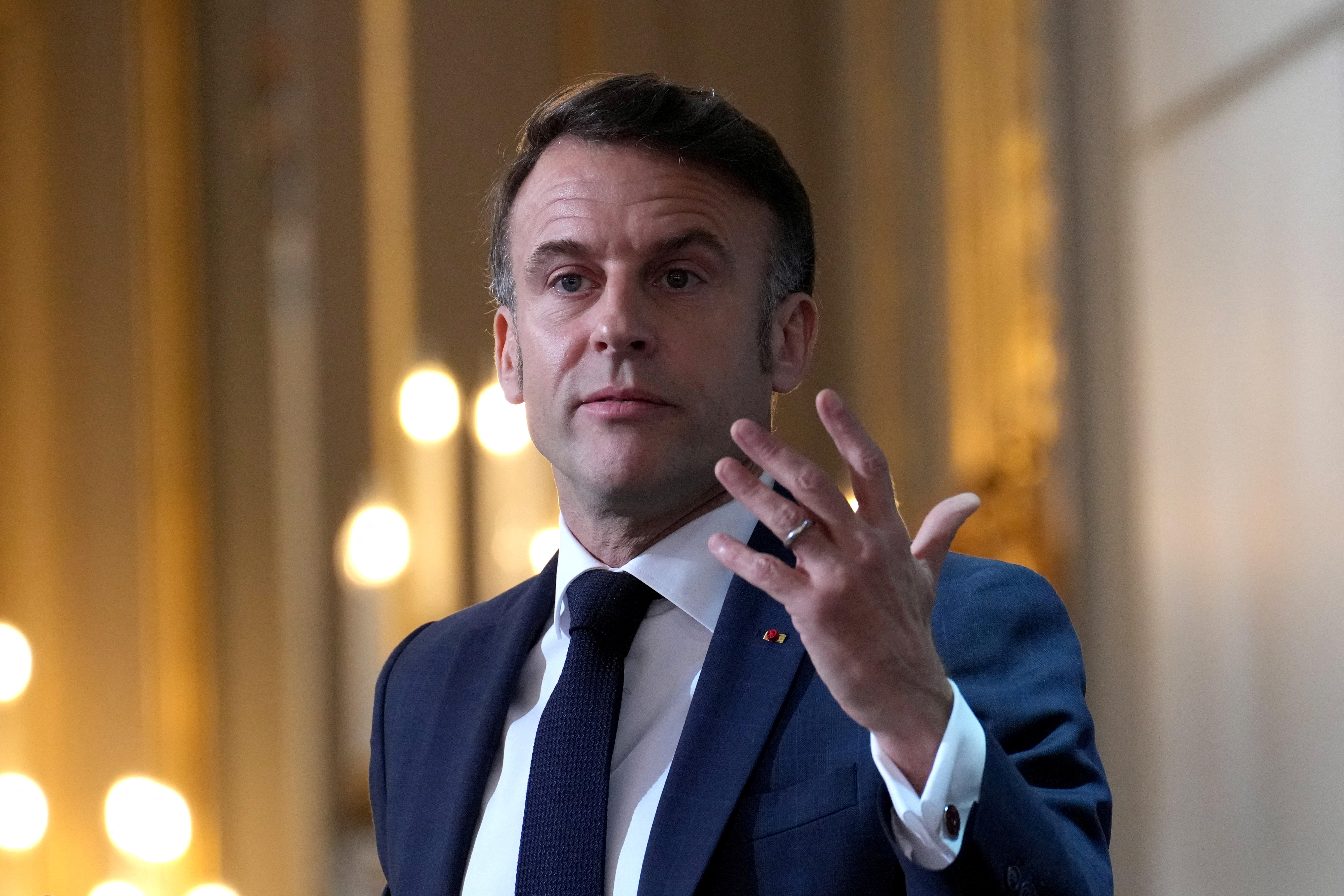 French President Emmanuel Macron delivers his speech, at the Elysee Palace in Paris