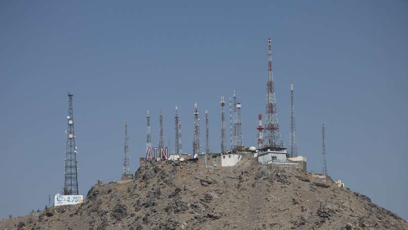 Telecom antennas stand on a mountain amid service shutdown across the country, in Kabul