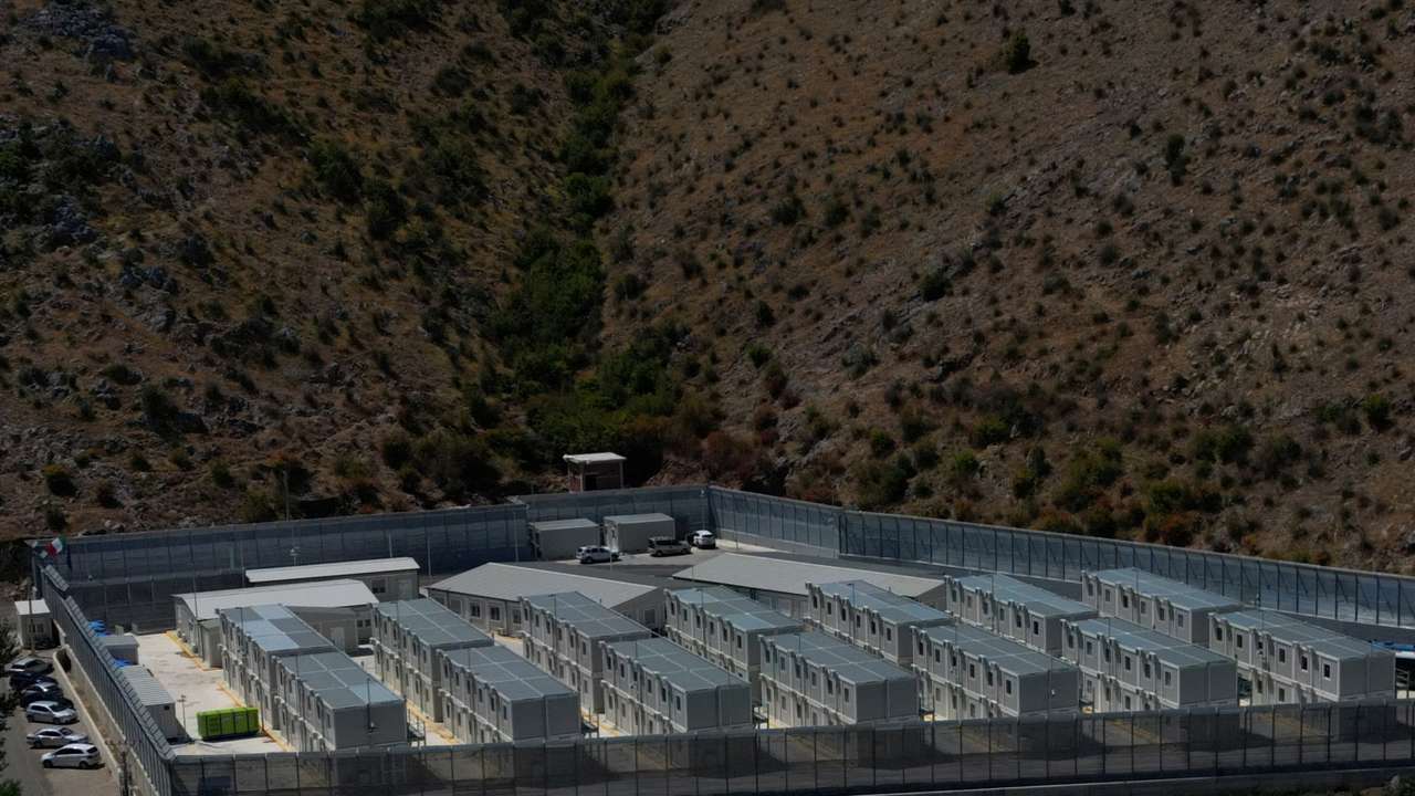A drone view shows a migrant detention centre in Gjader