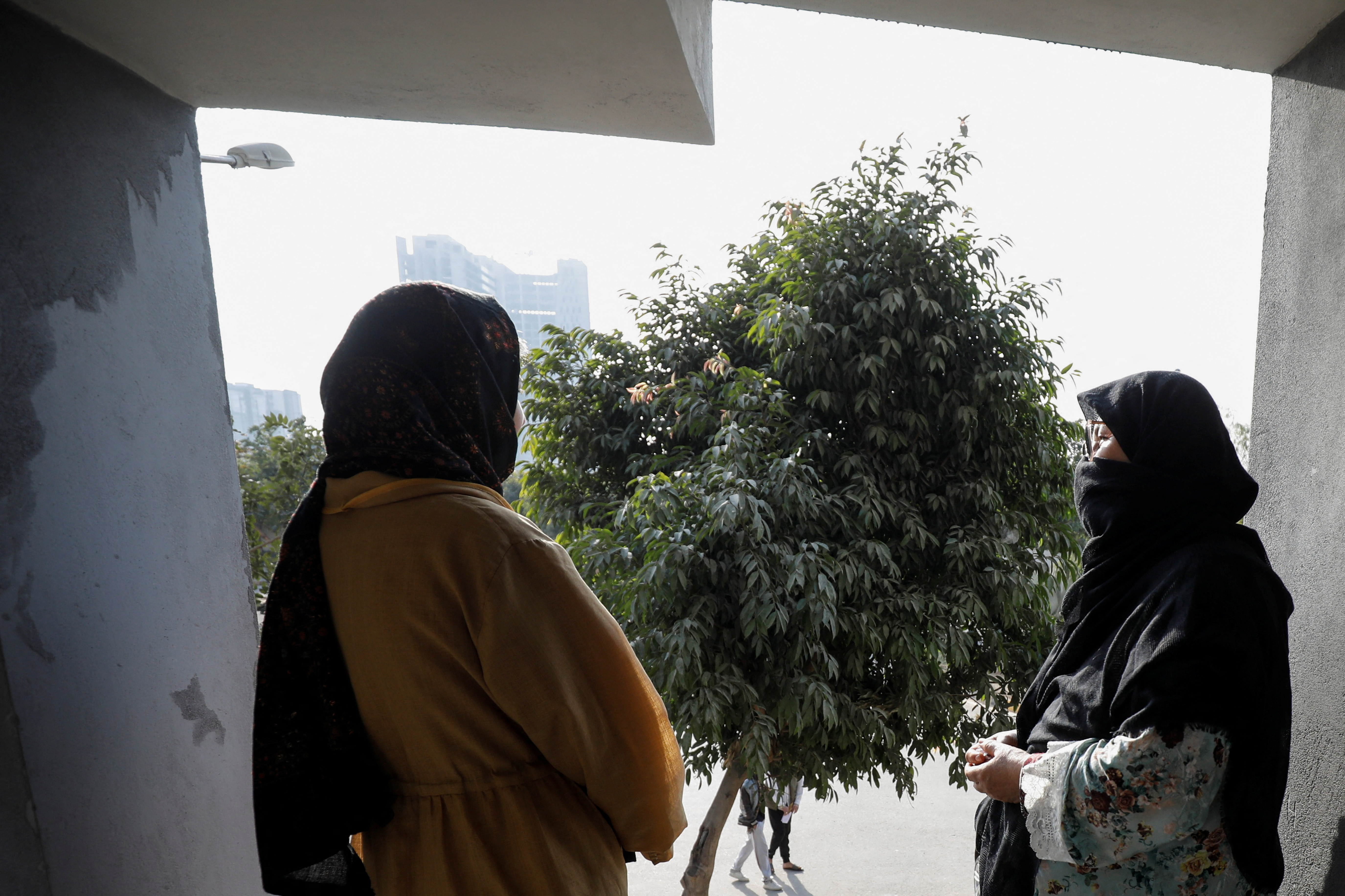 Women Afghan citizens, who are in the process for resettlement in the U.S., pose during an interview with Reuters on the outskirts of Islamabad
