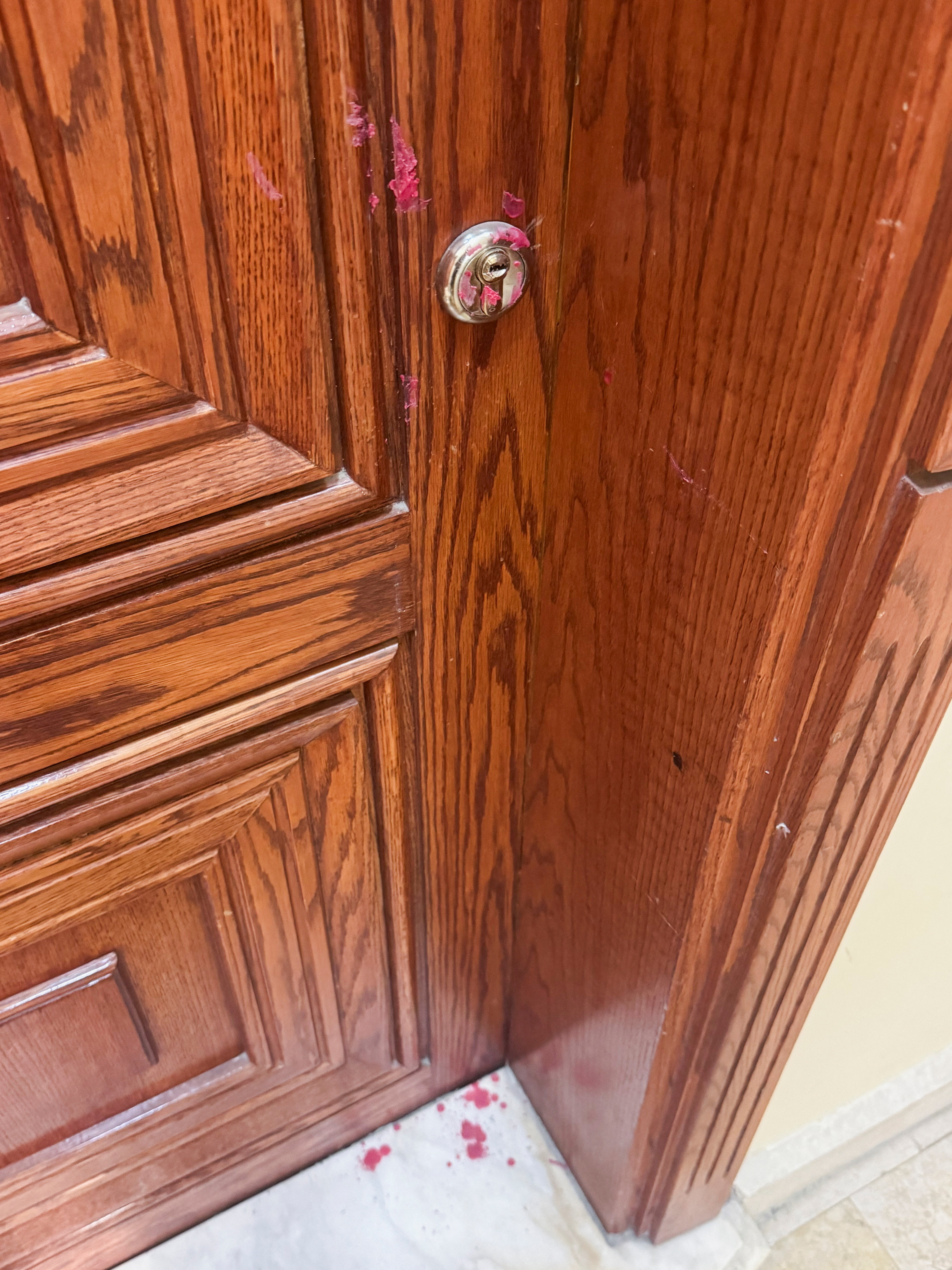 Red wax on the door of an apartment used as an office by Jamal al-Sharaa, brother of Syrian President Ahmed al-Sharaa, in Damascus