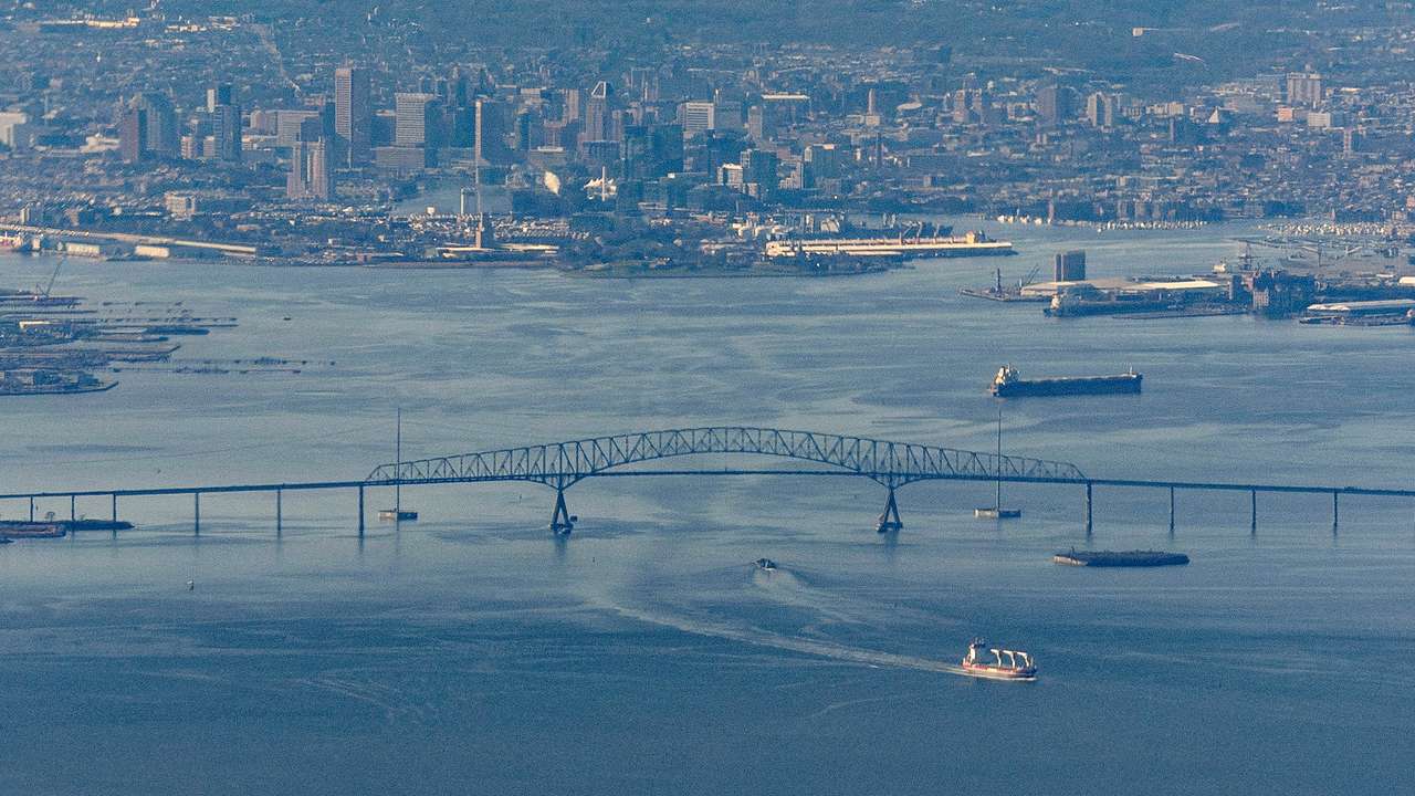 A ship moves under the Francis Scott Key Bridge near Baltimore, on the day U.S. President Joe Biden travels to Washington