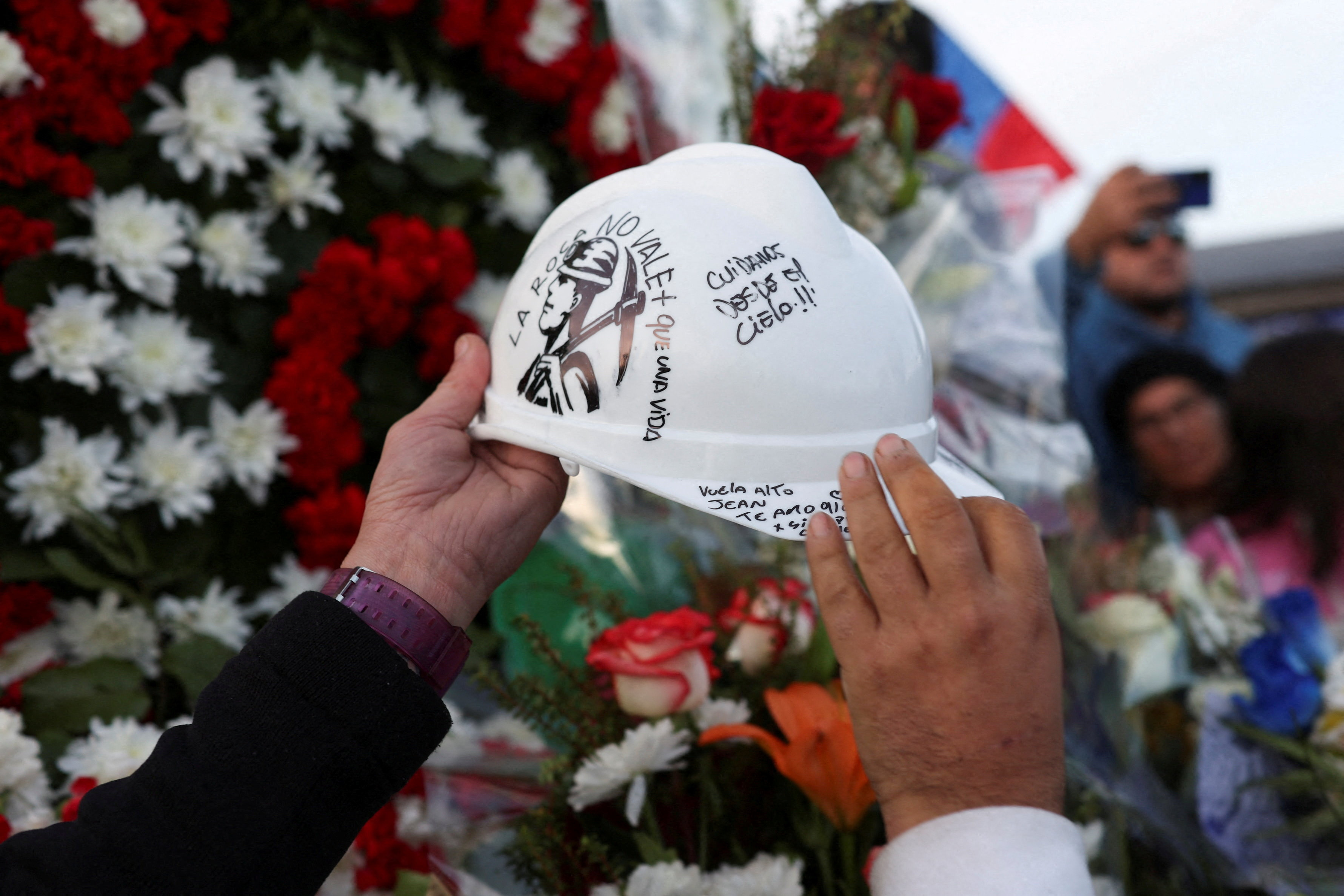 The funeral of Jean Miranda Ibaceta, one of the five miners, who died after being trapped following a collapse at El Teniente copper mine, in Rancagua