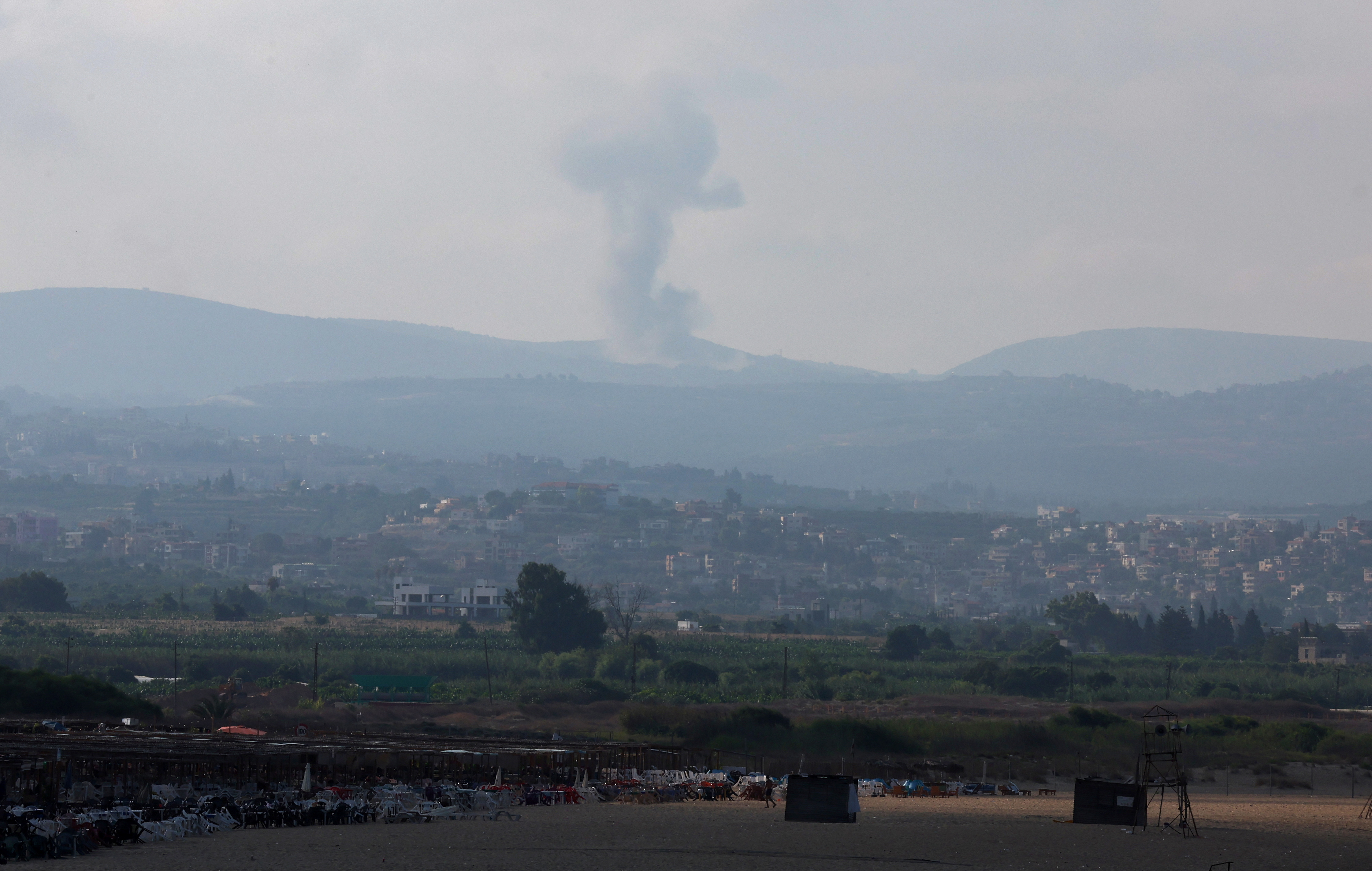 A view shows smoke on the Lebanese side of the border with Israel, as seen from Tyre