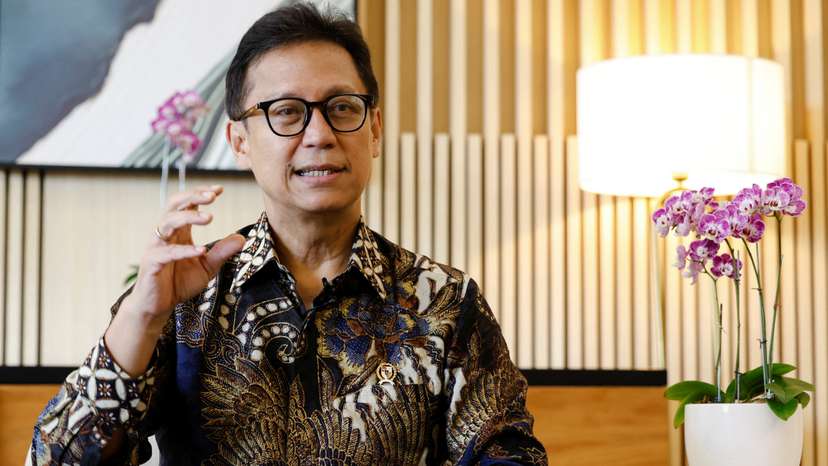 Indonesia's Health Minister Budi Gunadi Sadikin gestures during an interview with Reuters at his office in Jakarta