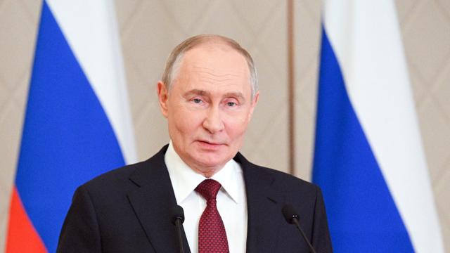Russian President Putin attends a press conference in Astana