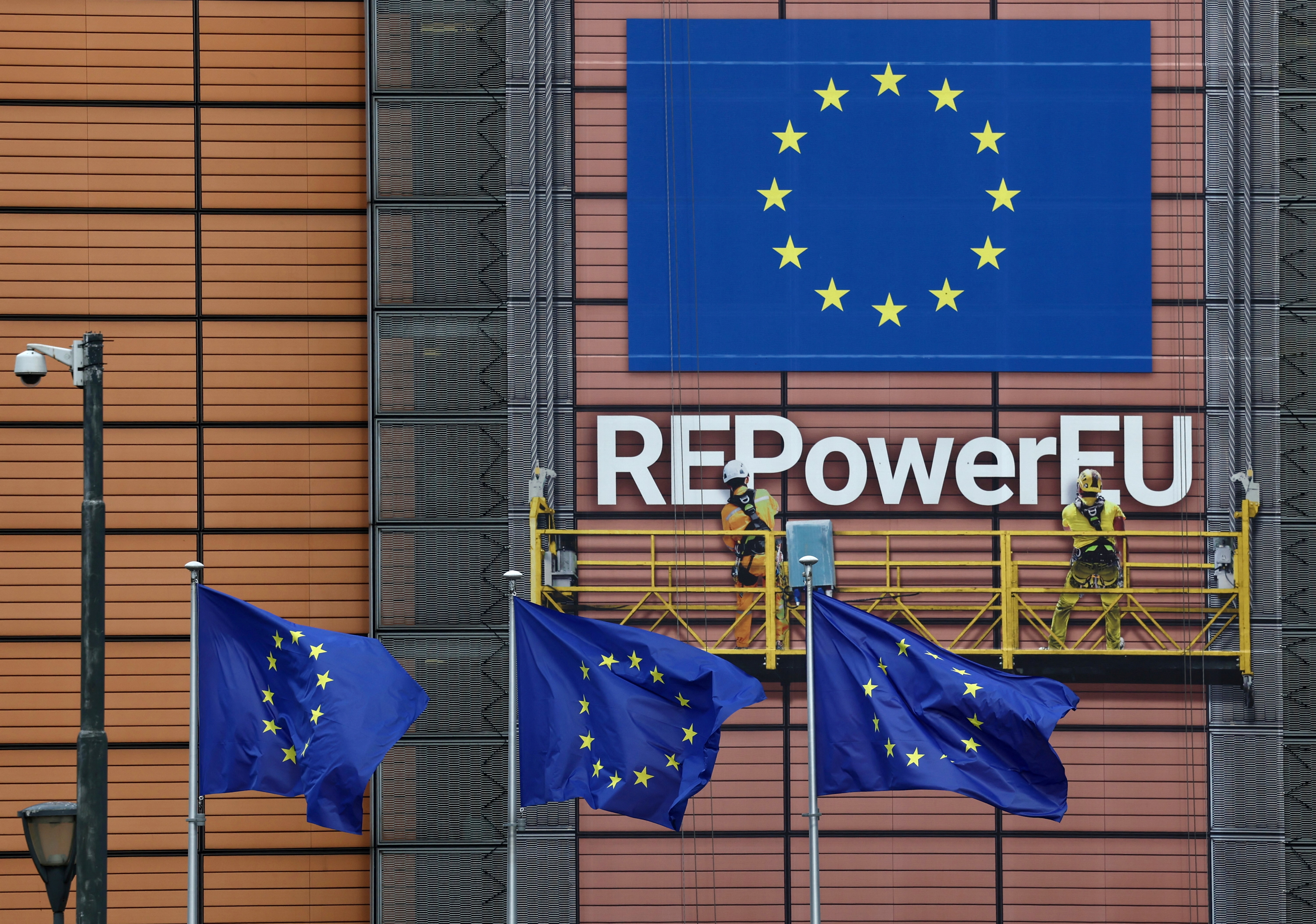 European Union flags flutter outside the EU Commission headquarters in Brussels
