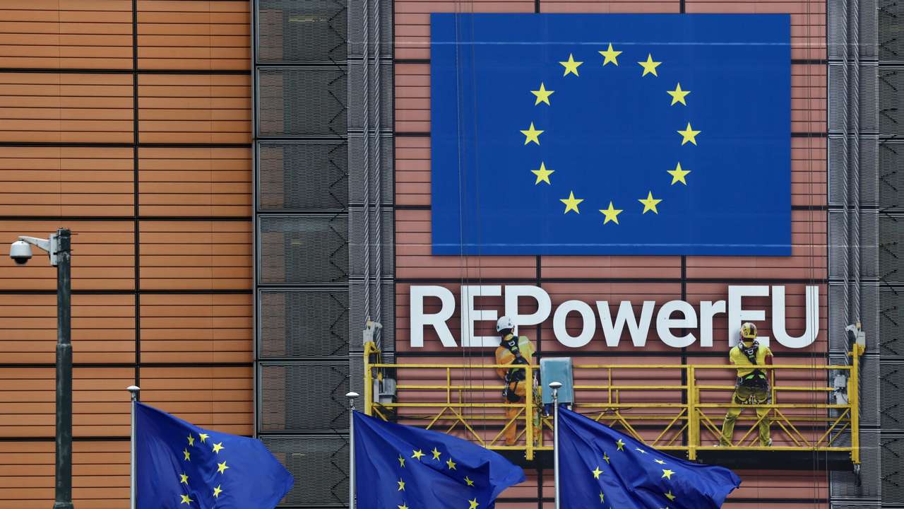 European Union flags flutter outside the EU Commission headquarters in Brussels