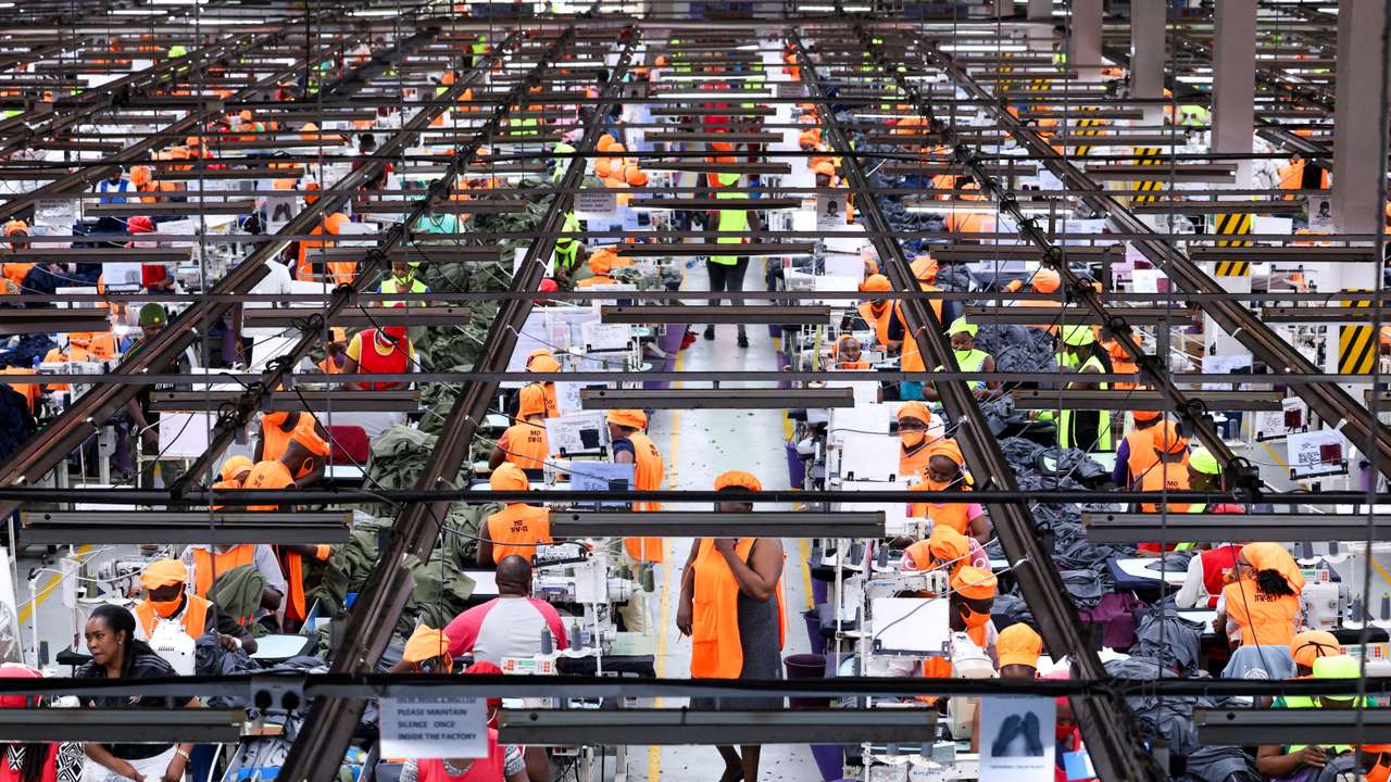 Kenyan workers prepare clothes for export at the New Wide Garment EPZ factory in Kitengela