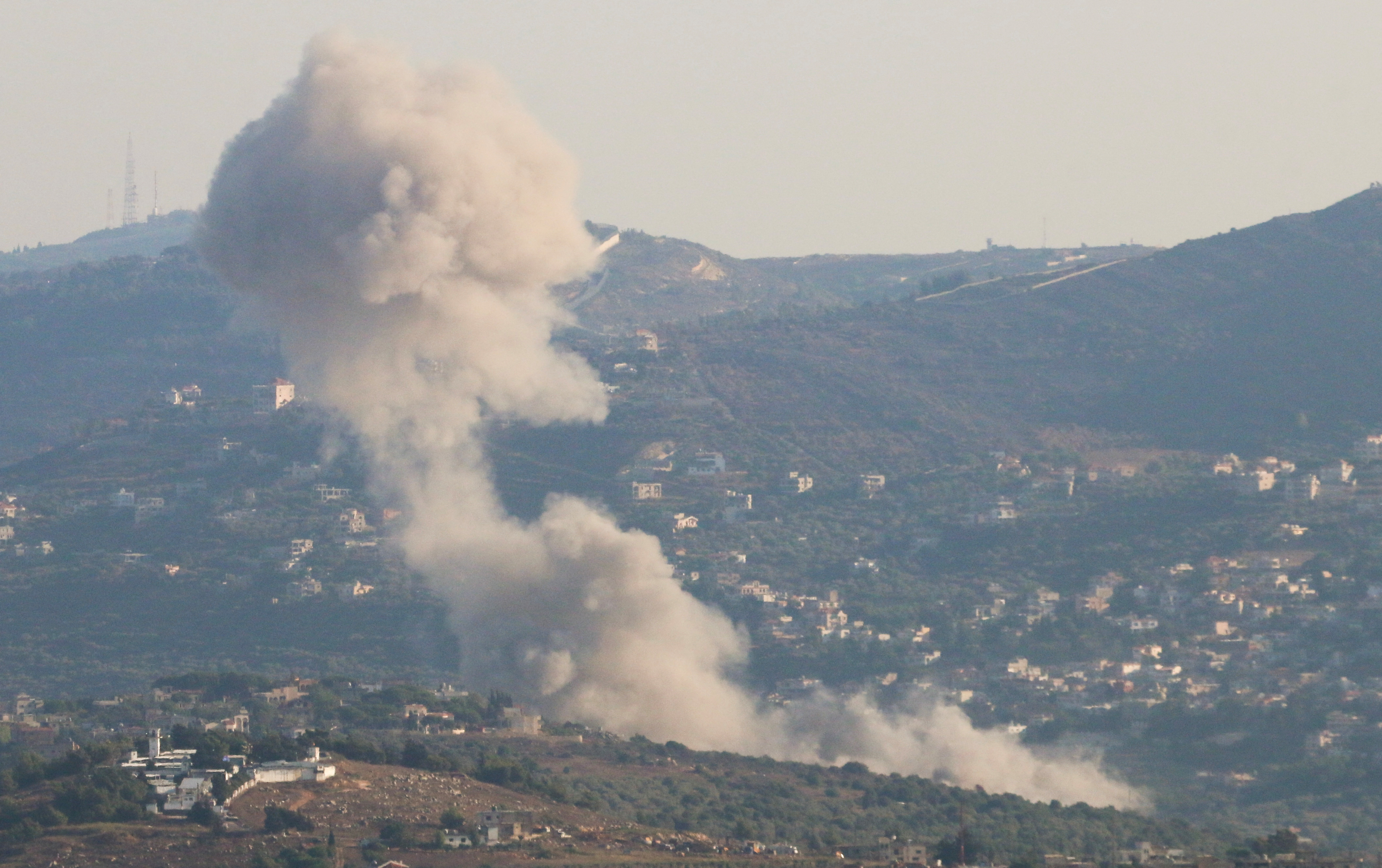 Smoke rises from Kfar Kila, amid cross-border hostilities between Hezbollah and Israeli forces, as pictured from Marjayoun, near the border with Israel