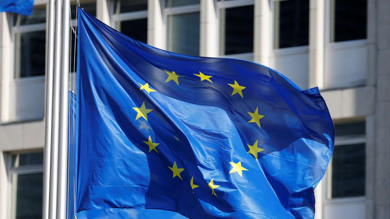 European Union flags fly outside the European Commission headquarters in Brussels