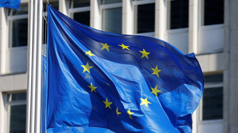 European Union flags fly outside the European Commission headquarters in Brussels