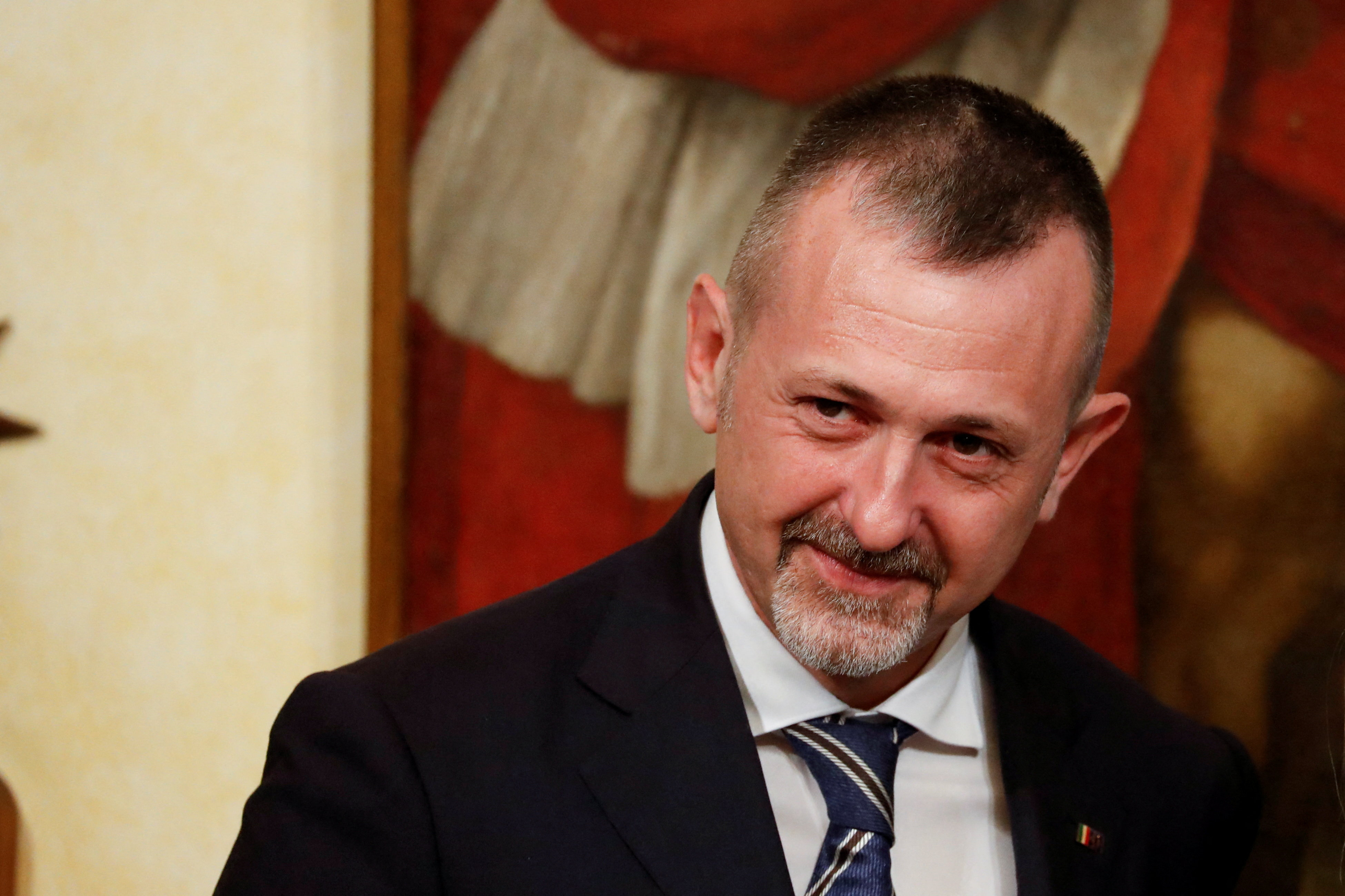 FILE PHOTO: Andrea Delmastro Delle Vedove, Undersecretary of State at the Ministry of Justice, looks on during his appointment ceremony at Chigi Palace, in Rome