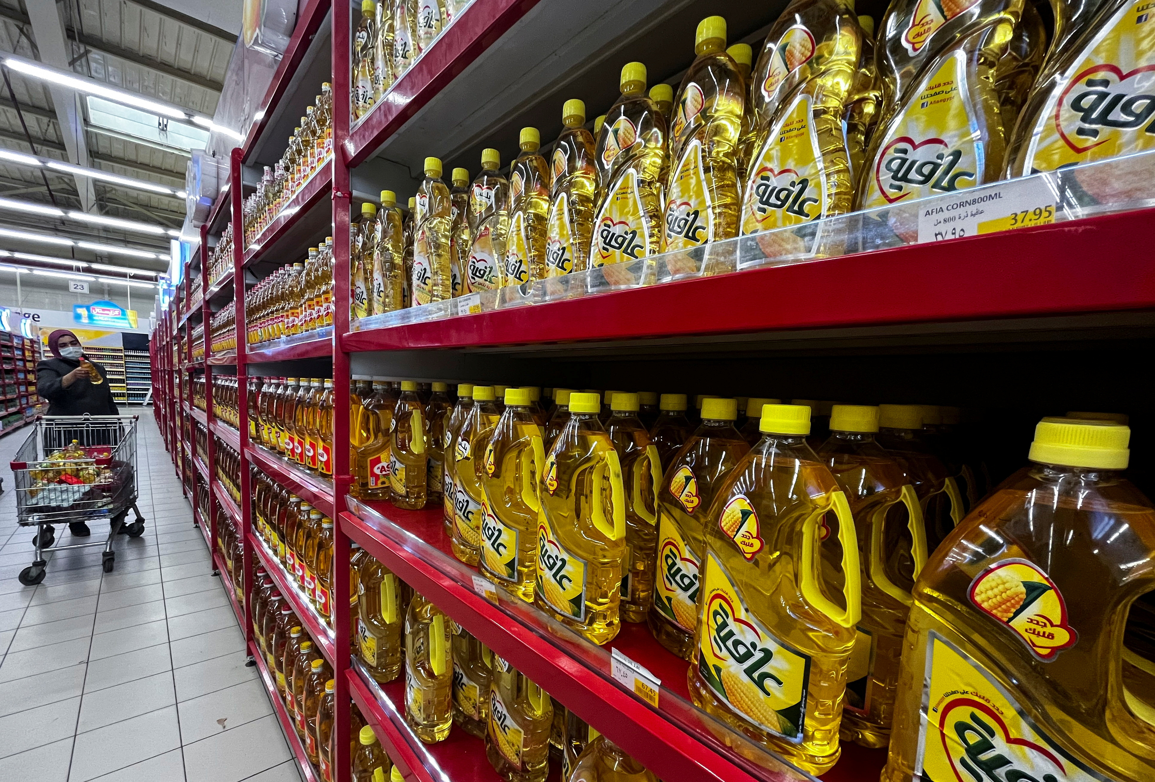 People shop at Carrefour hypermarket in Maadi City Center, in a suburb of Cairo