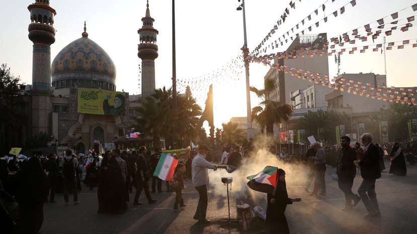 Iranians attend an anti-Israel gathering in Tehran