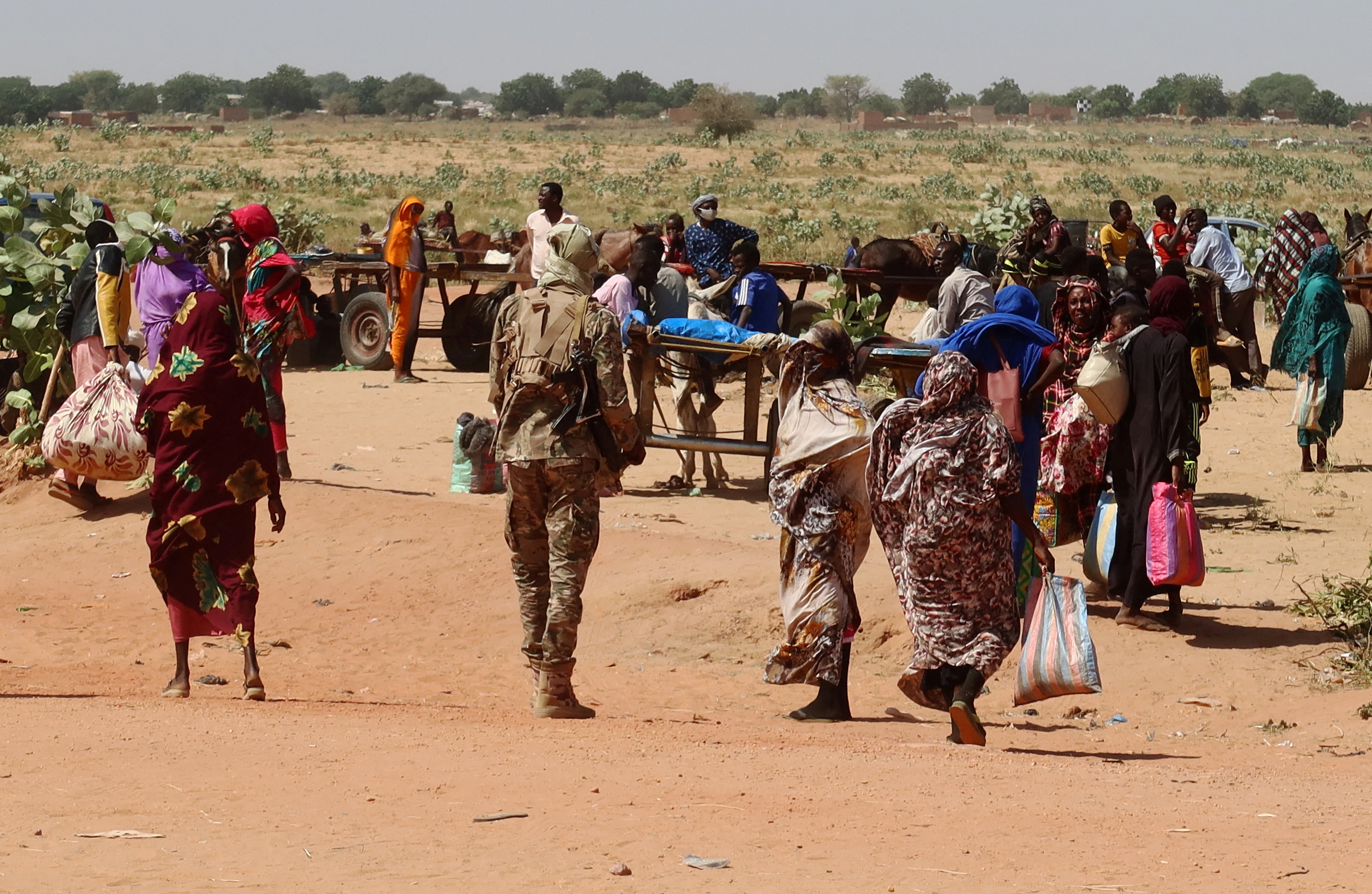 FILE PHOTO: Families escaping Ardamata in West Darfur