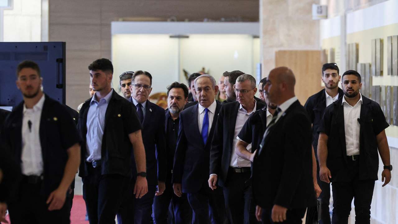Israeli Prime Minister Netanyahu arrives to his Likud party faction meeting at the Knesset,in Jerusalem