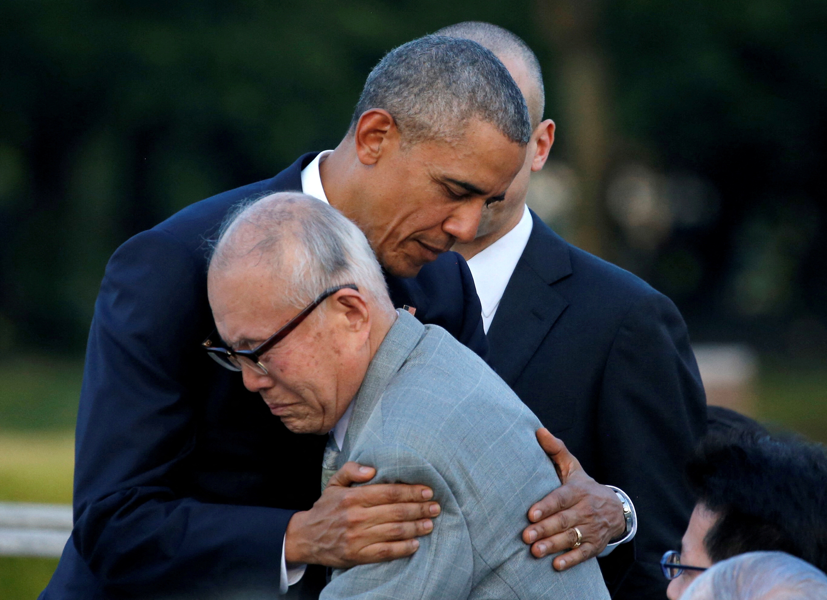 FILE PHOTO: U.S. President Barack Obama hugs with atomic bomb survivor Shigeaki Mori as he visits Hiroshima Peace Memorial Park in Hiroshima, Japan
