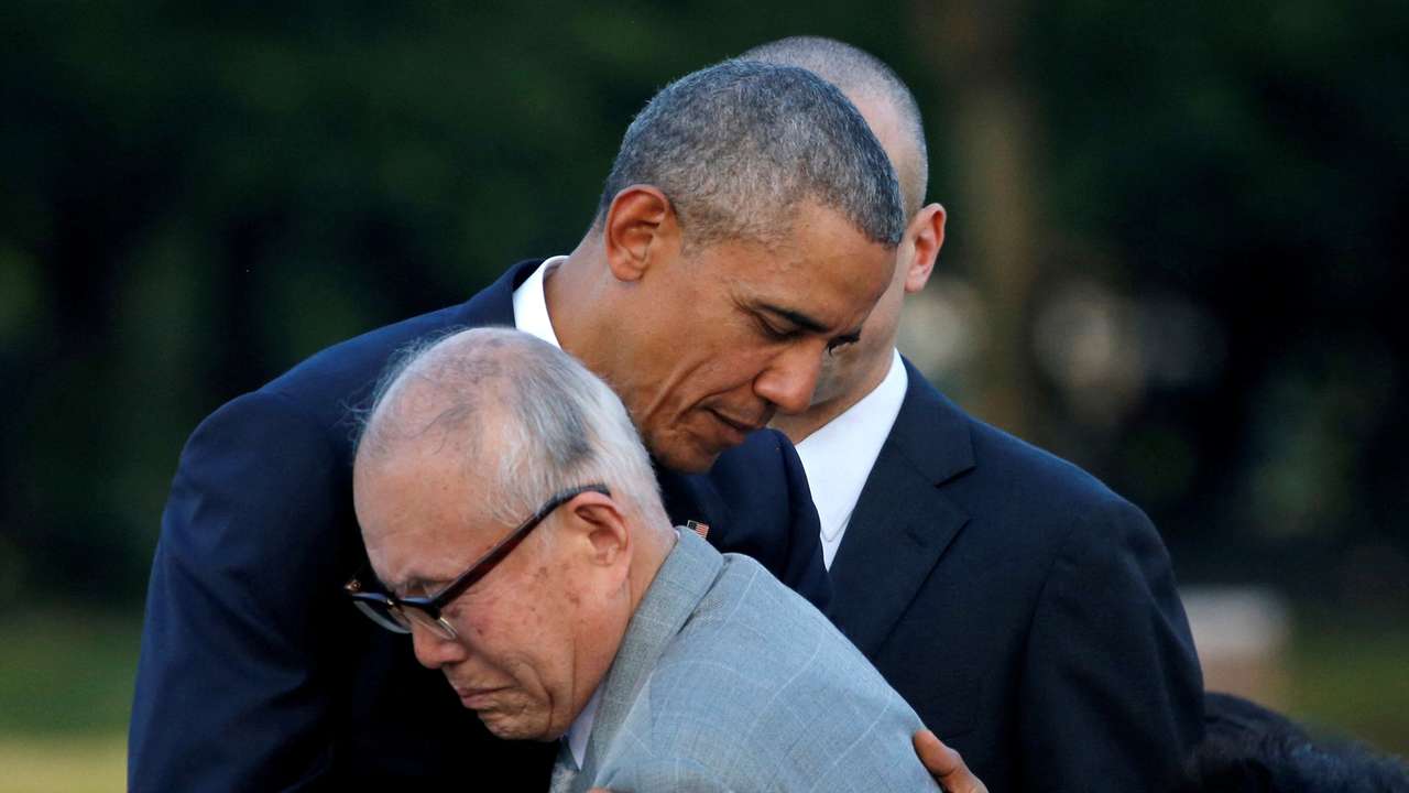 FILE PHOTO: U.S. President Barack Obama hugs with atomic bomb survivor Shigeaki Mori as he visits Hiroshima Peace Memorial Park in Hiroshima, Japan