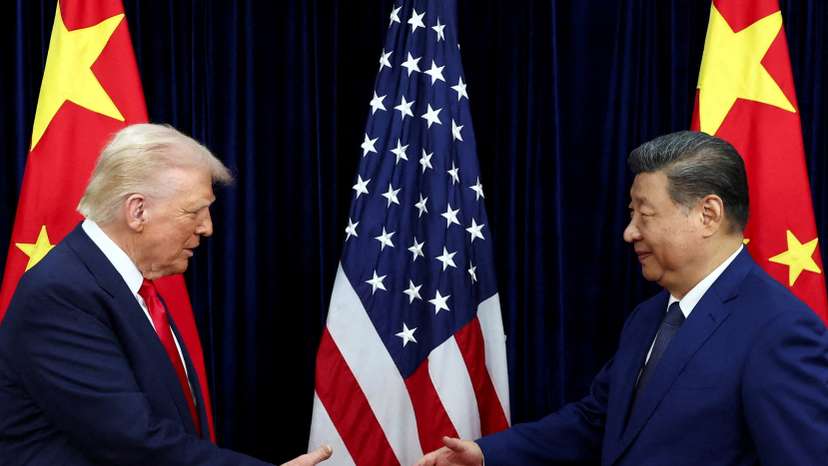 FILE PHOTO: U.S. President Donald Trump meets with Chinese President Xi Jinping on the sidelines of the APEC summit, in Busan