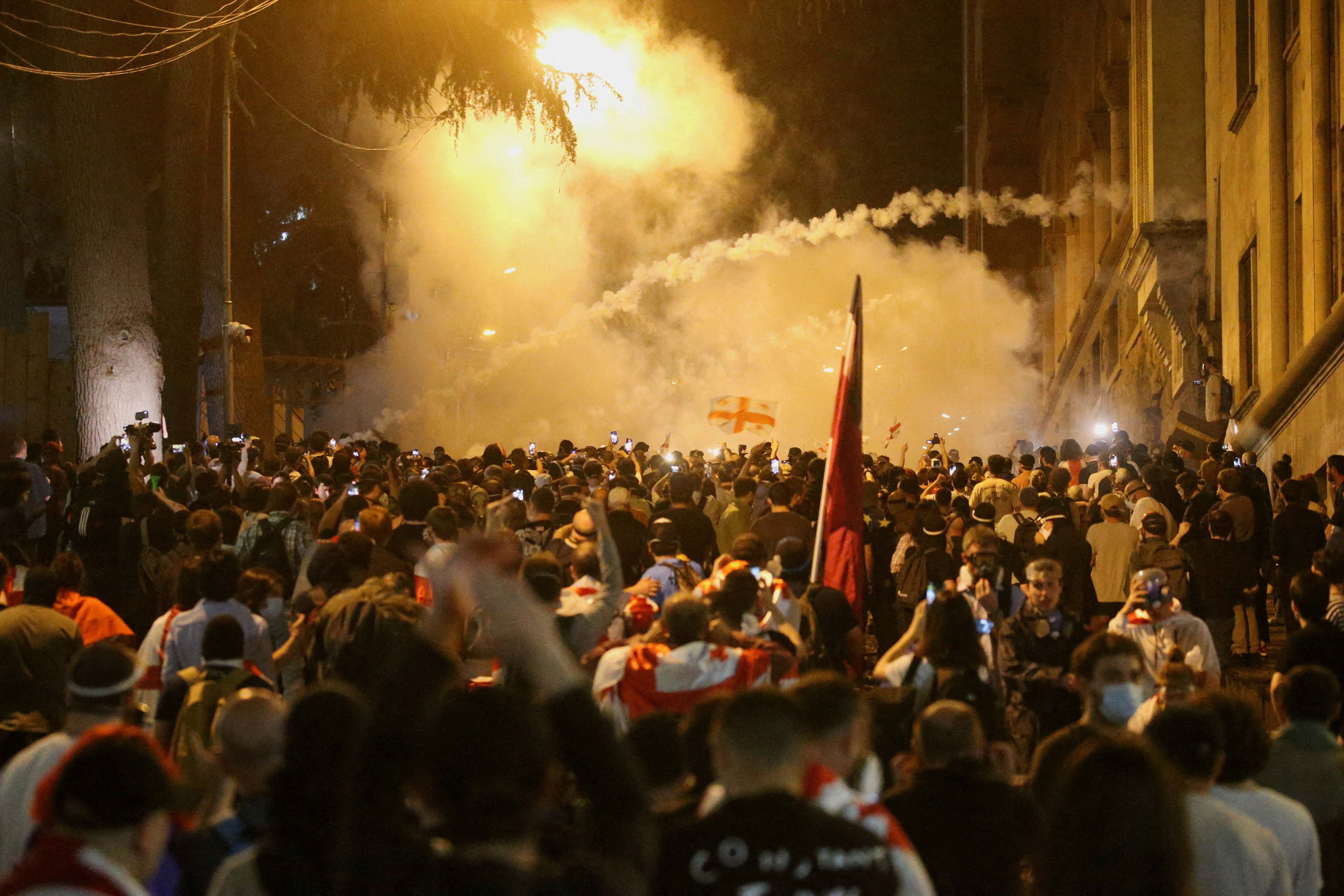 FILE PHOTO: FILE PHOTO: Demonstrators hold a rally to protest against a bill on "foreign agents", in Tbilisi