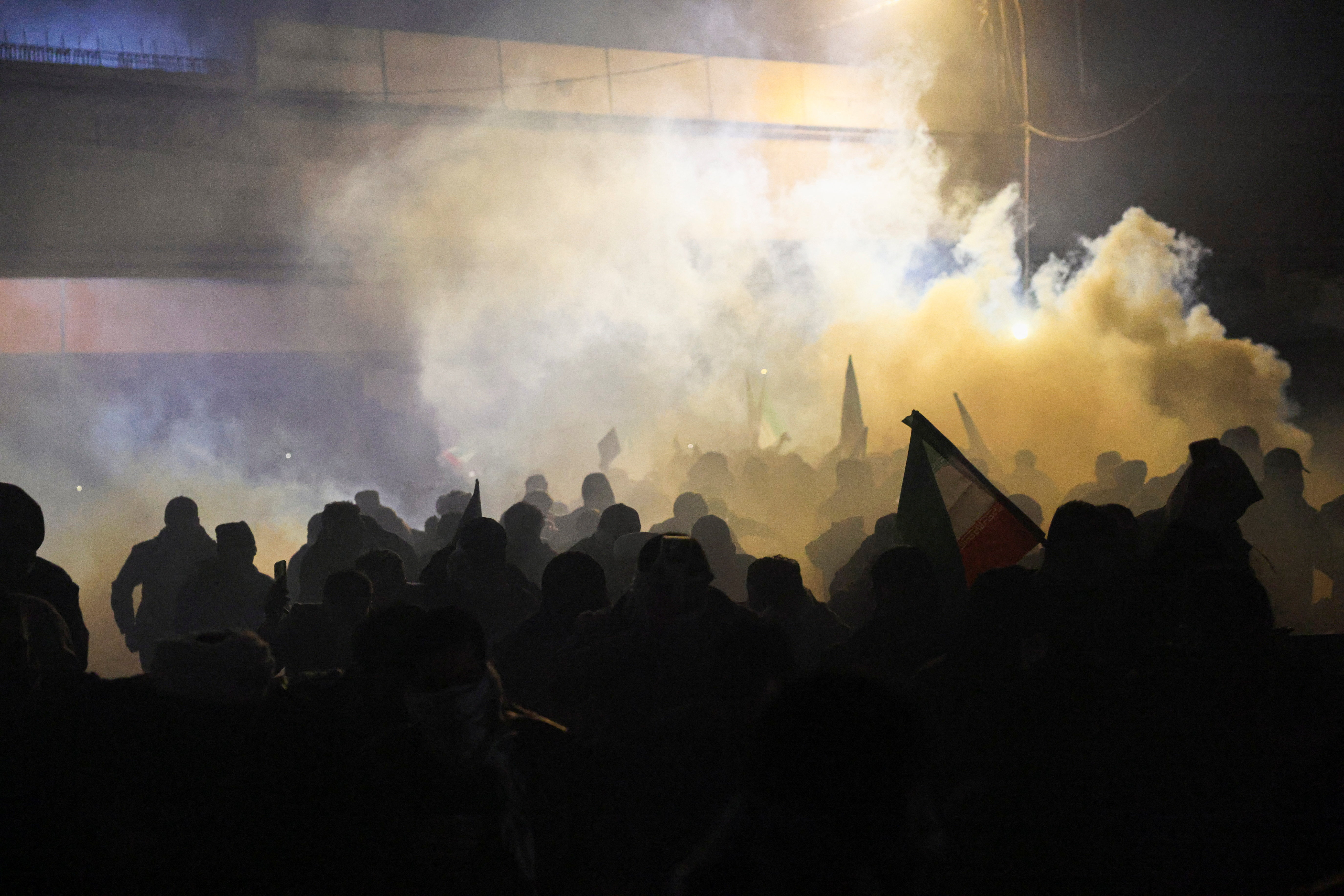 Supporters of Iraqi Shi'ite armed groups gather after the killing of Iran's Supreme Leader Ayatollah Ali Khamenei, in Baghdad