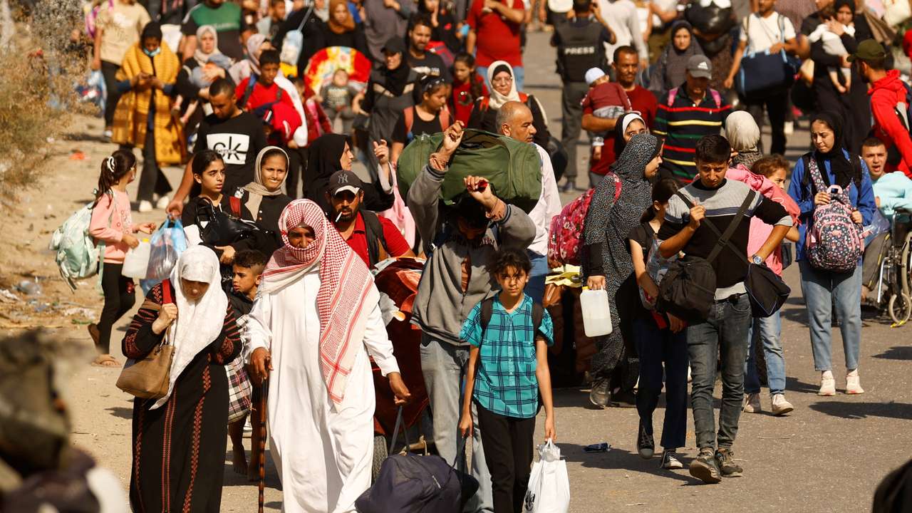 Palestinians fleeing north Gaza move southward, in the central Gaza Strip