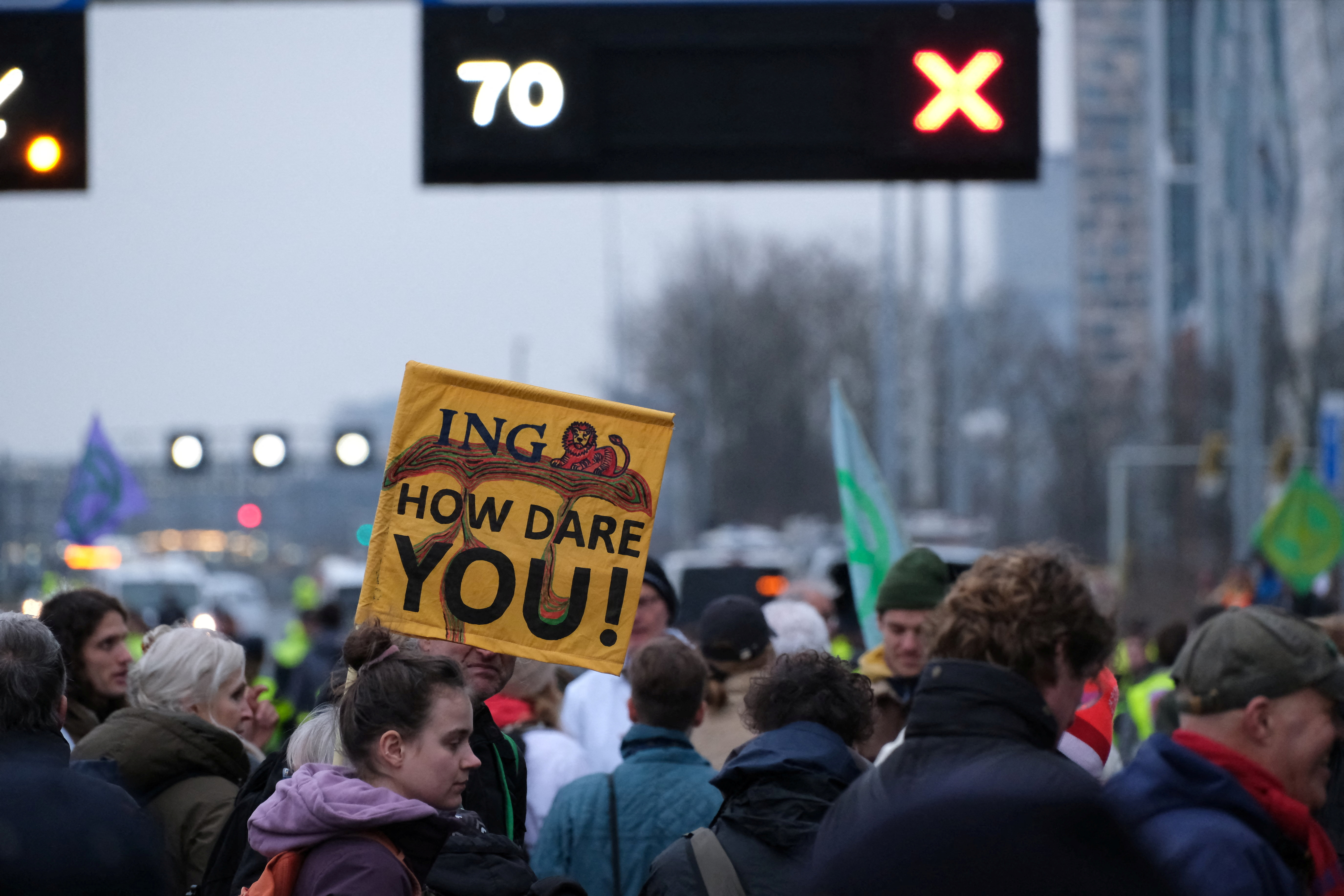 Activists from Extinction Rebellion Netherlands protest against ING on a highway in Amsterdam