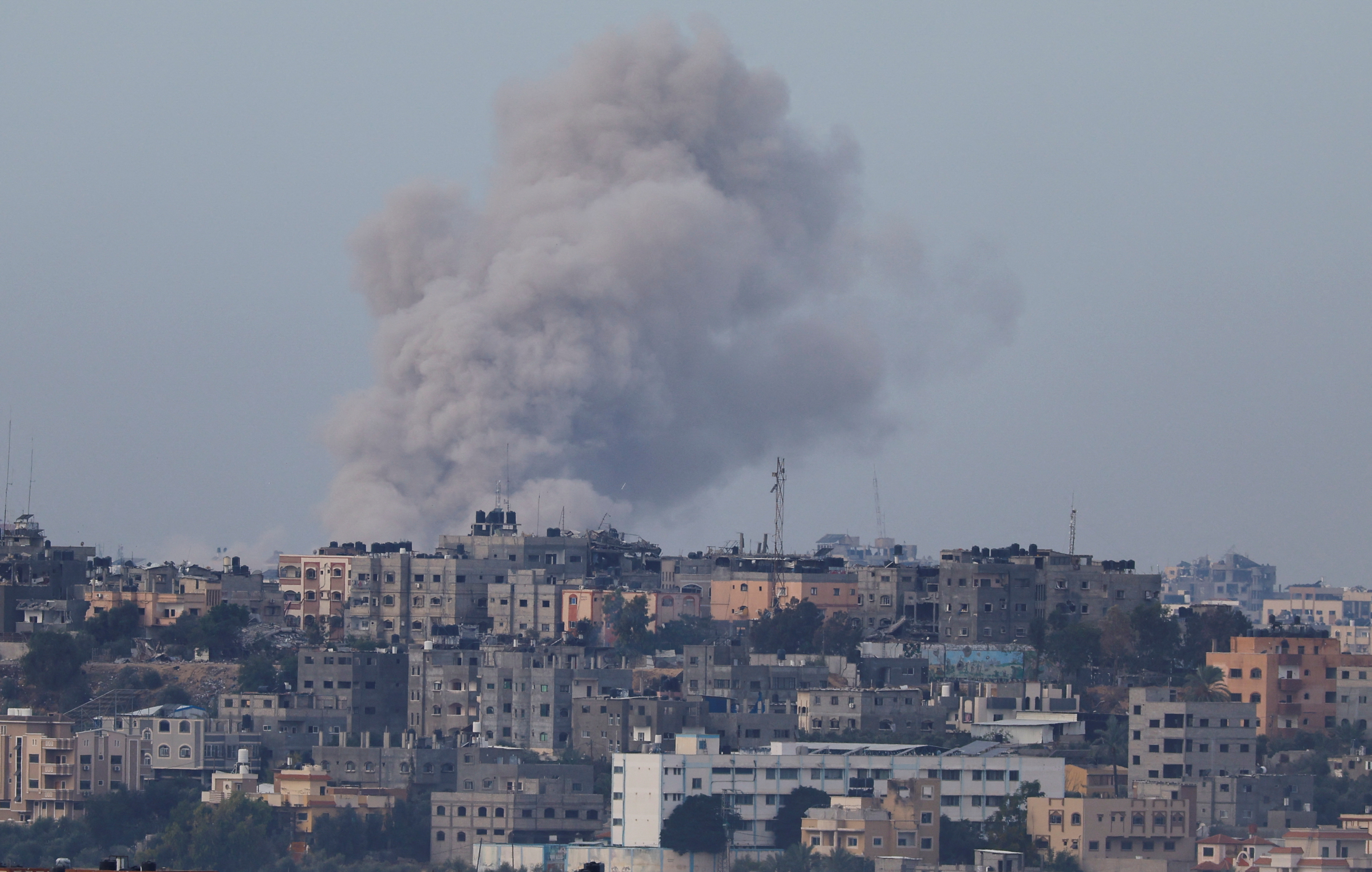 Smoke rises after Israeli air strikes in Gaza, as seen from southern Israel