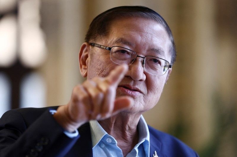 Prommin Lertsuridej, Secretary General to Prime Minister Srettha Thavisin, speaks during an interview with Reuters at Government House in Bangkok