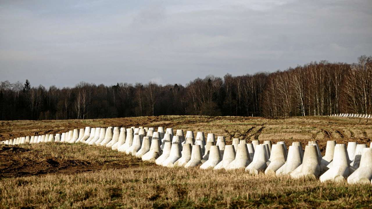 FILE PHOTO: Polish PM Tusk visits the first part of a system East Shield in Dabrowka