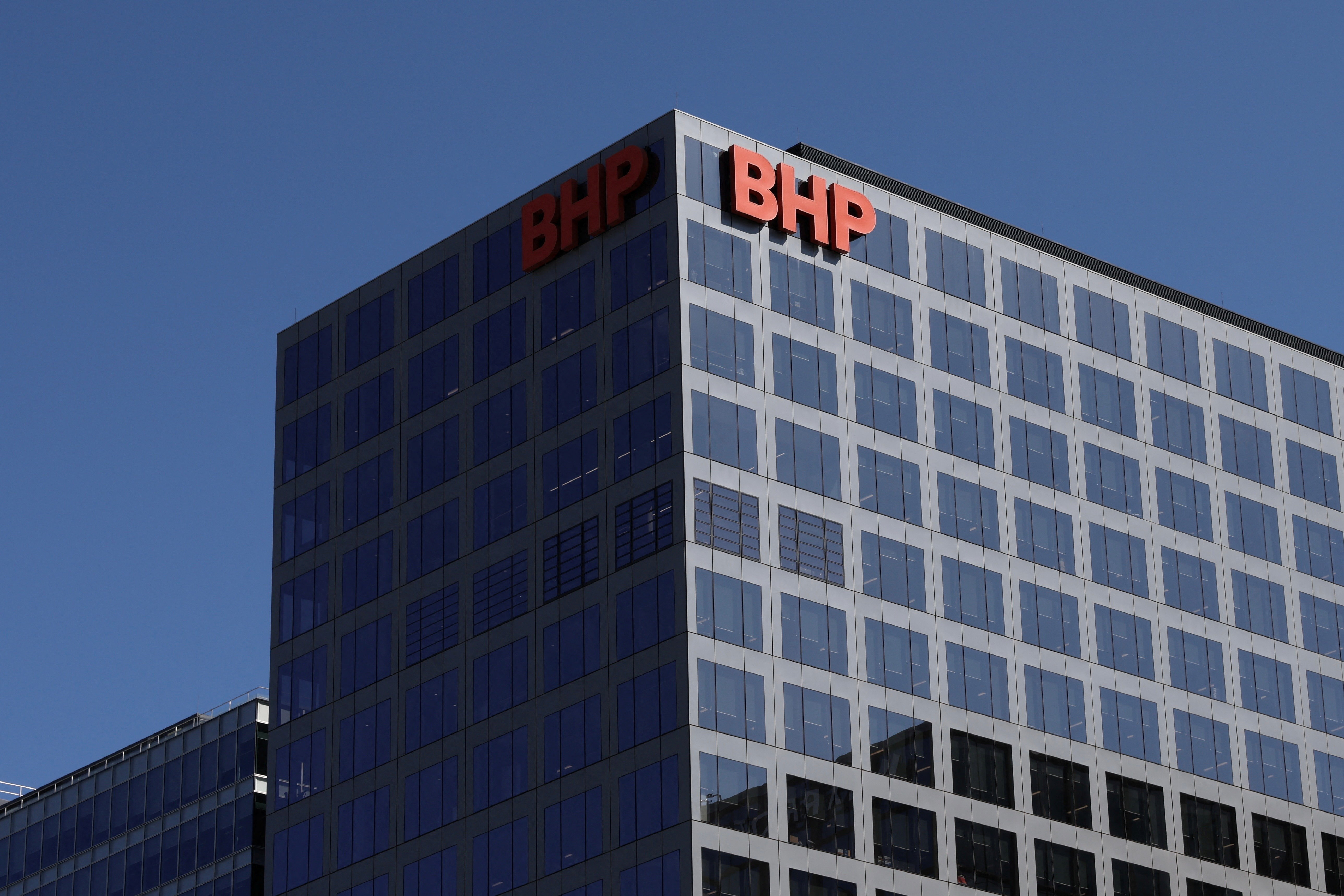 A BHP Group logo is displayed on their building in Adelaide